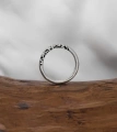 Серебряное кольцо с вплавленными черными камнями