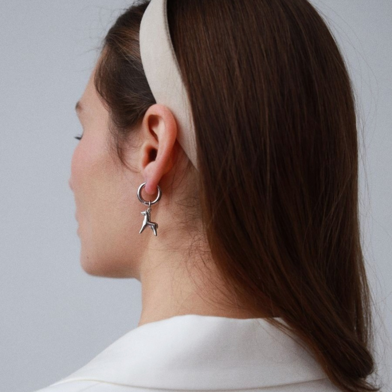 Моносерьга Ход конём