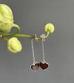 Серебряные серьги с сердцами из янтаря на длинной цепочке