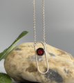 Серебряное колье овальное с кругом из янтаря